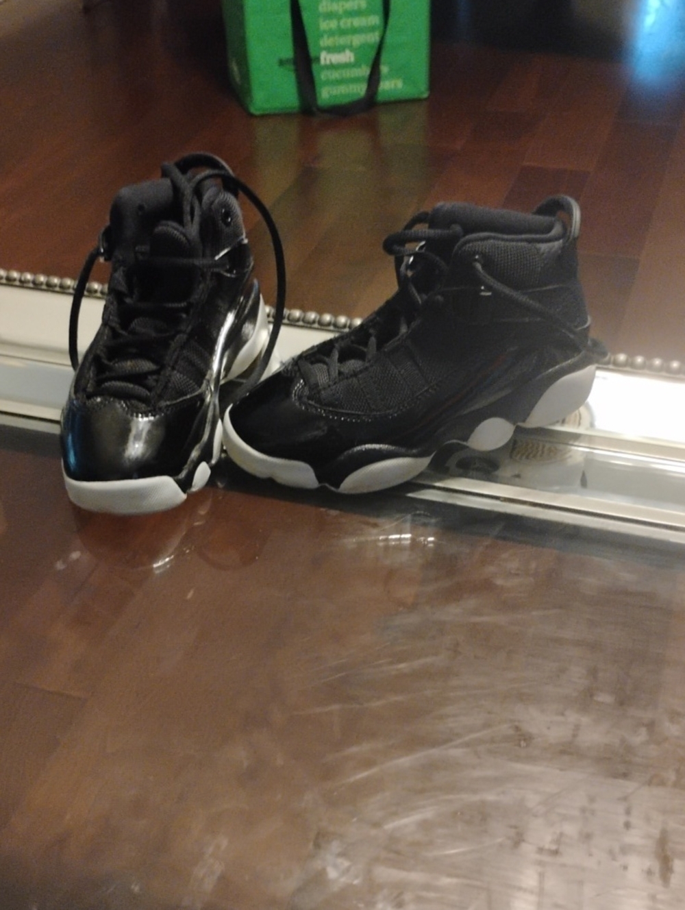 Jordan Kids Black and White High-Top Sneakers